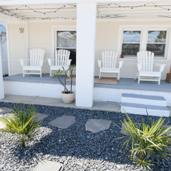 A beach porch space with rocking chairs provides a perfect spot to soak up the sun, savor the ocean breeze and relax in a comfortable and calming environment