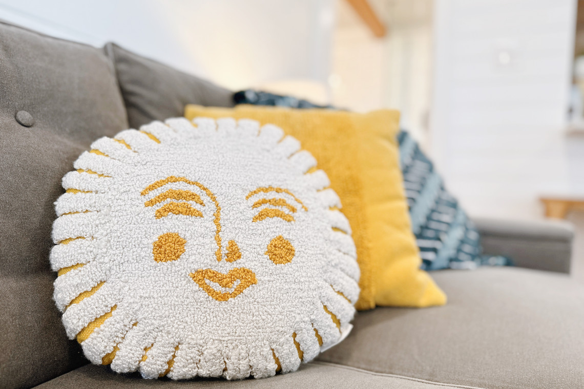 This Sunrise pillow adds the perfect amount of sunshine to the space and it brings a cheerful and uplifting vibe, spreading warmth and joy with its vibrant design